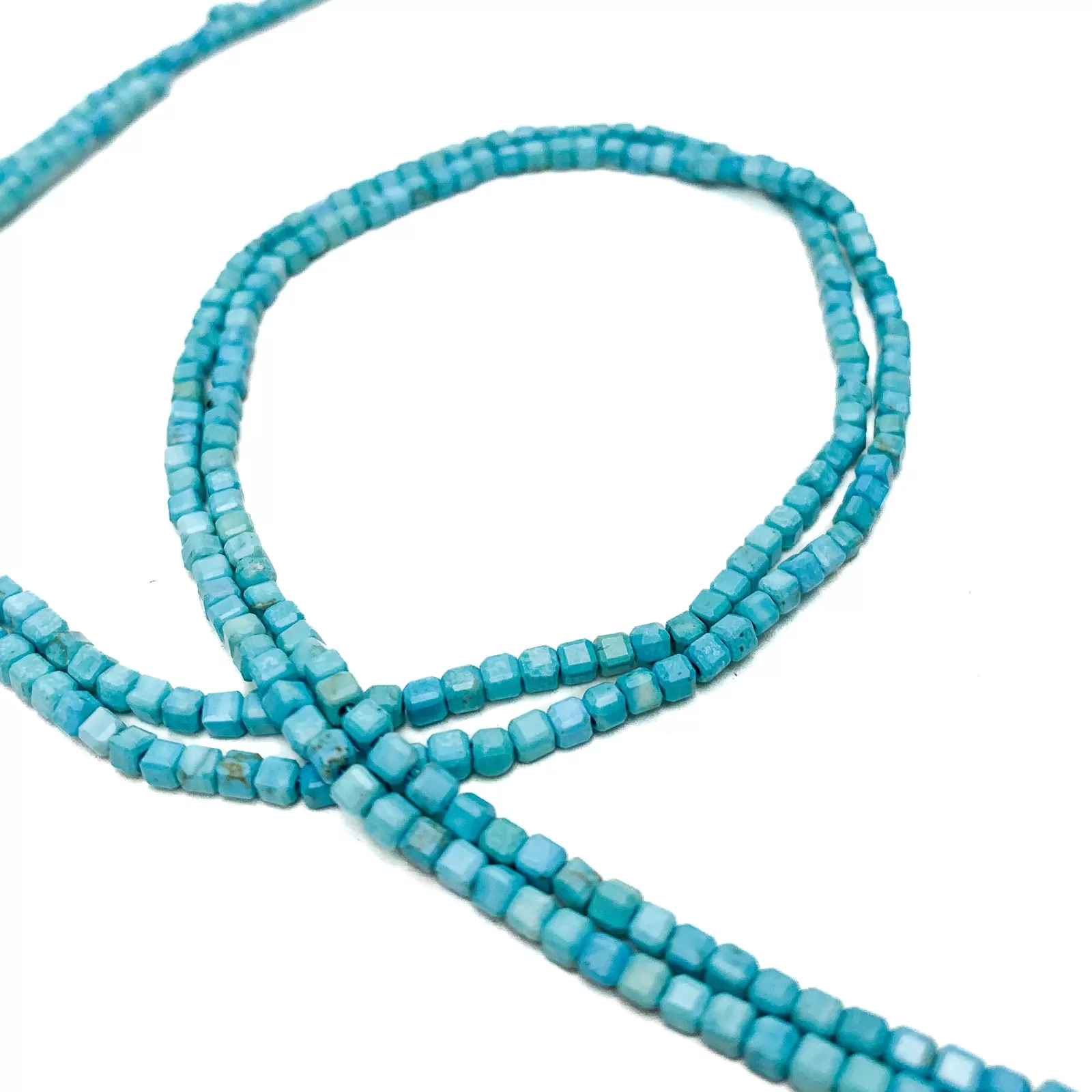 Arizona Turquoise Light 2.5mm Faceted Cubes Bead Strand