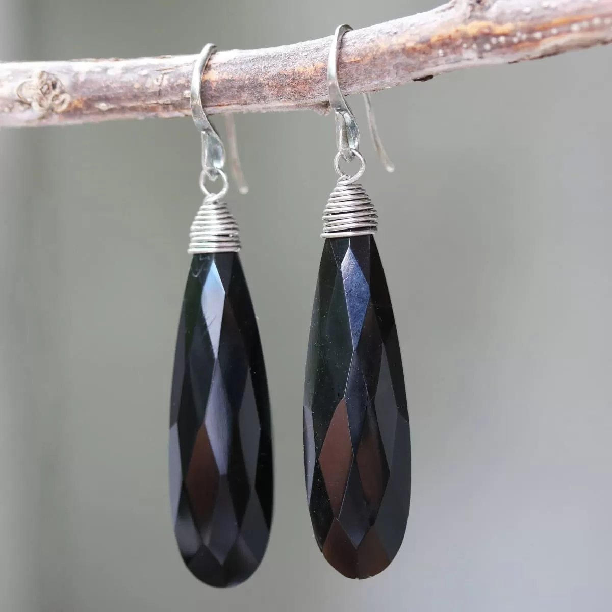 Black onyx teardrop faceted earrings with silver wire wrapped on oxidized sterling silver hooks style