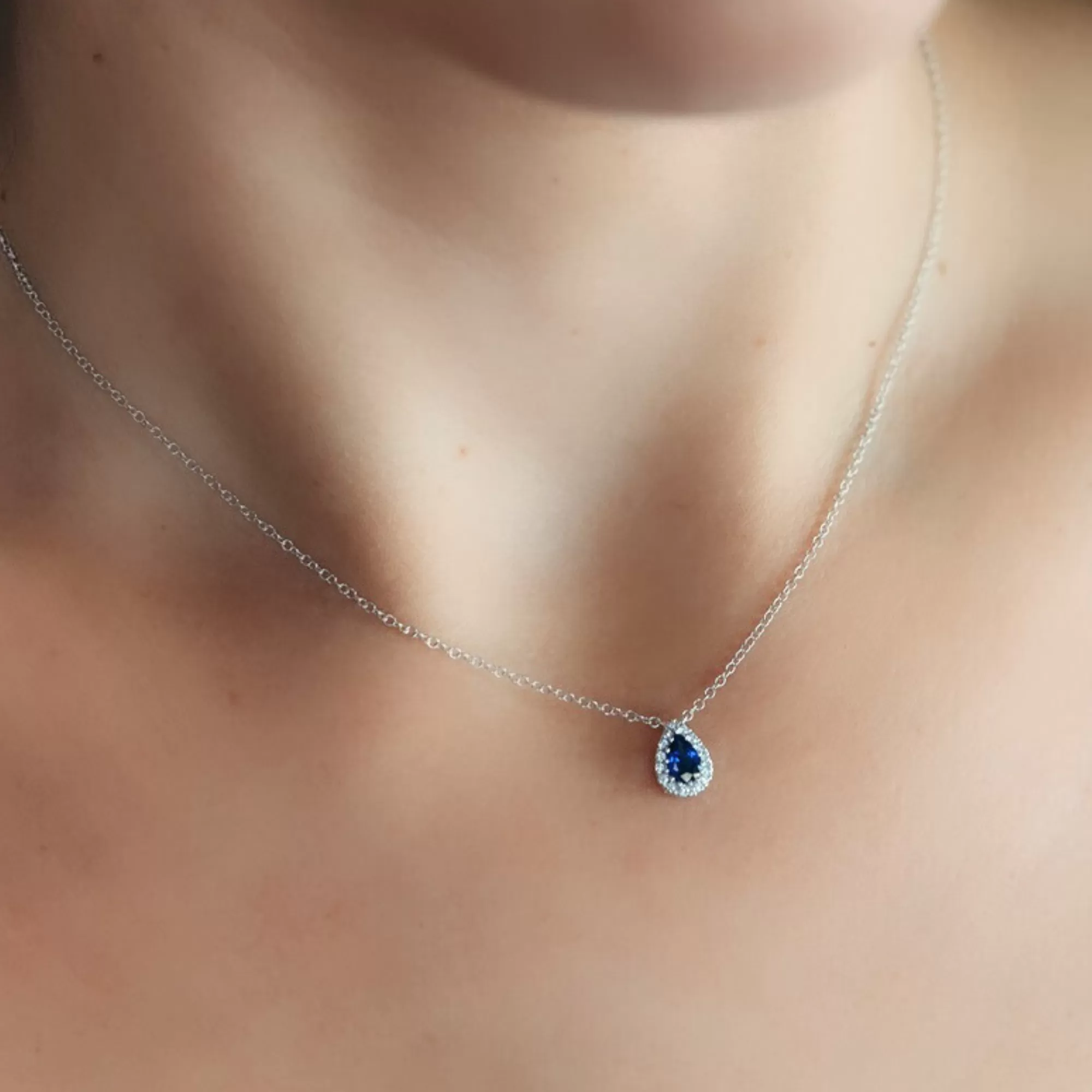 Pear Shaped Blue Sapphire With Halo Necklace