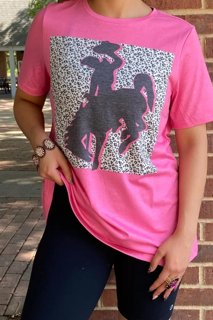 Pink top with bronc rider graphic