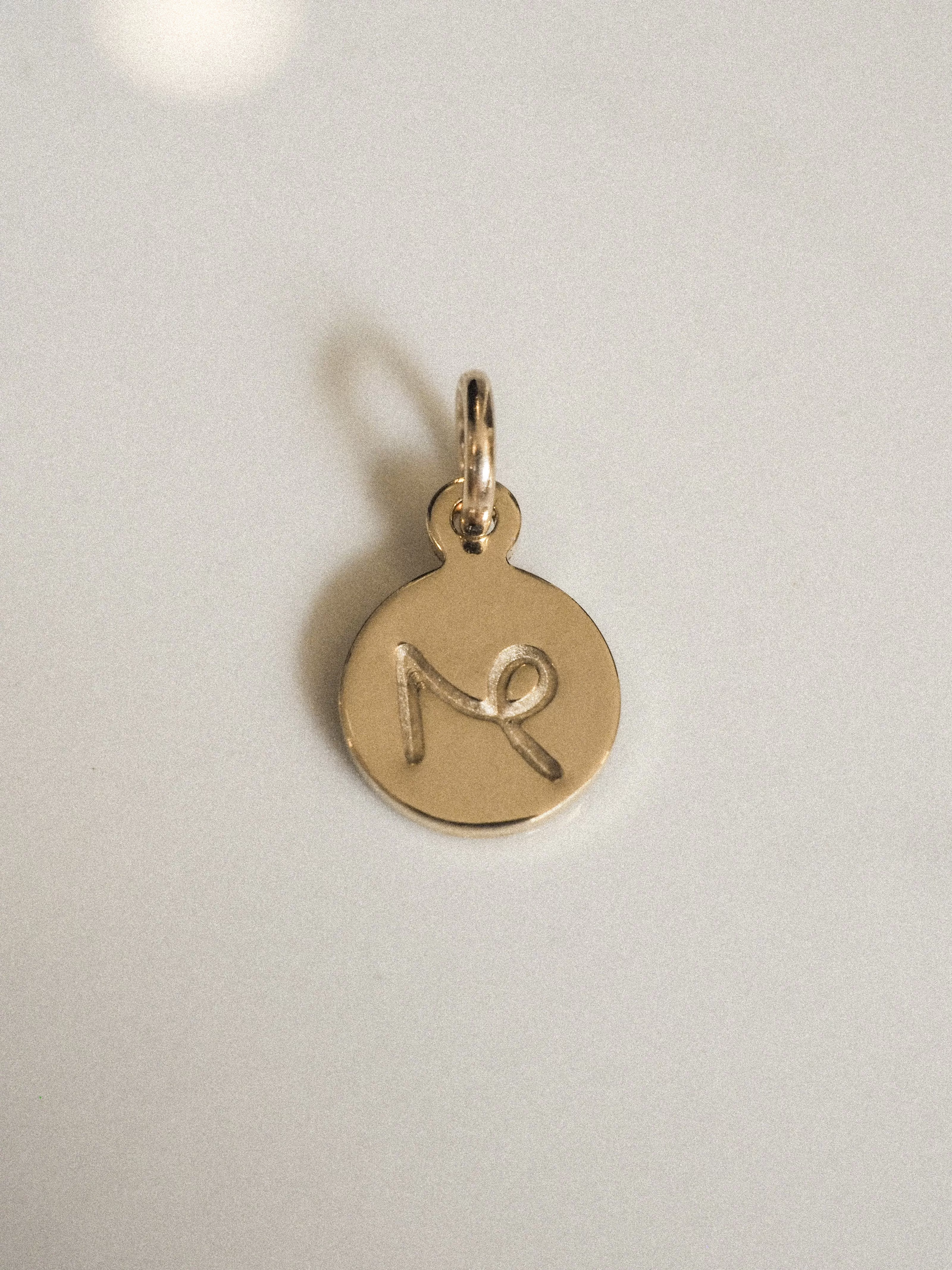 ZODIAC CHARM